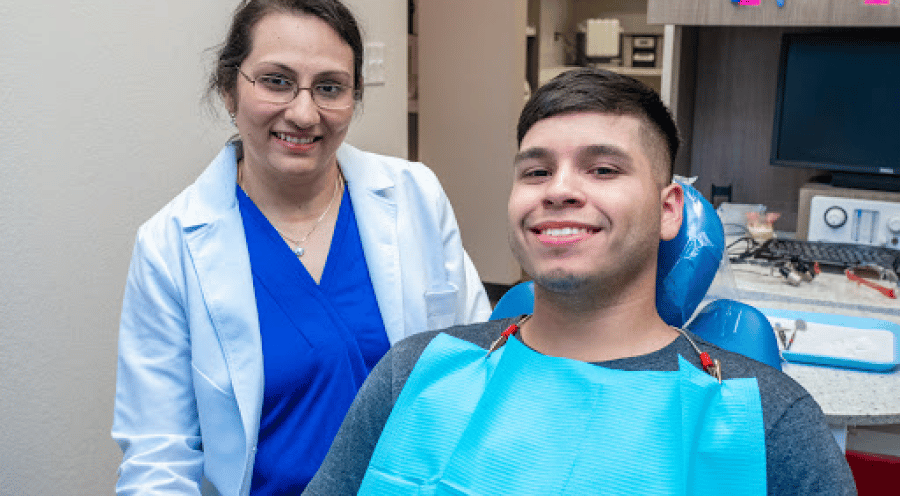 happy patient smiling in dental chair