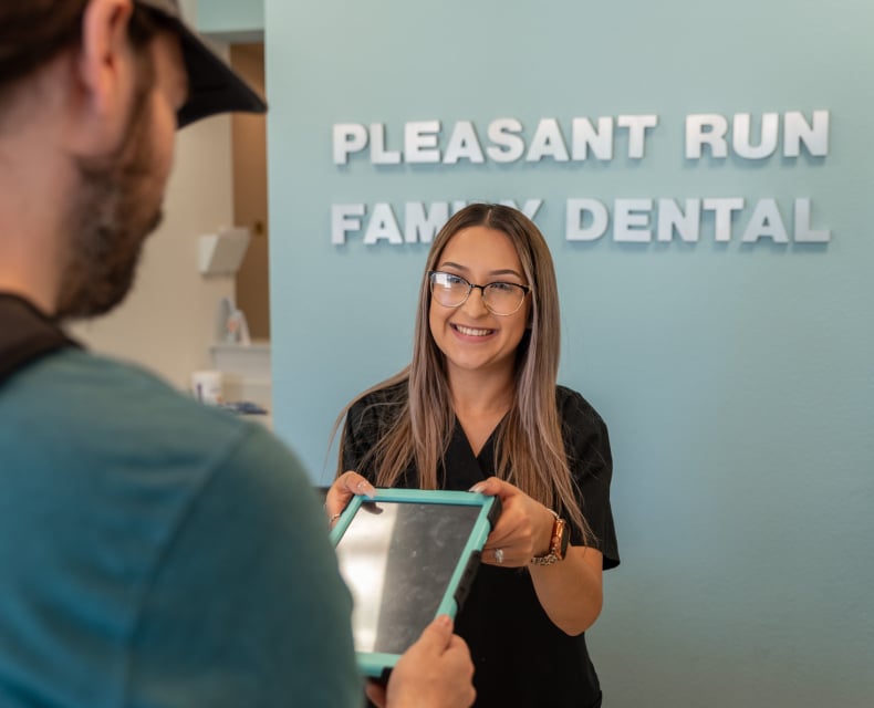 patient checking in at Pleasant Run Family Dentistry in Lancaster